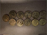 Eleven Assorted One Dollar Coins