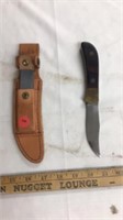 Knife with case and sharpening stone