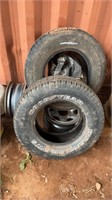 A GOODYEAR P255/70/R 16 TIRE AND A TELLURIDE LT