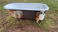 A CAST IRON SOAKER TUB, 55 INCHES LONG, 27 INCHES
