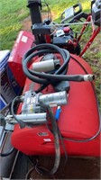 A FUEL TANK, WITH A NEW FUEL PUMP, NOZZLE IS