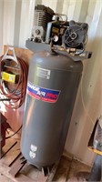 AN UPRIGHT AIR COMPRESSOR