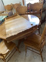 Table and six chairs, table is 48 inches in