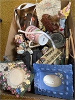 Box of picture frames, home decor items and more