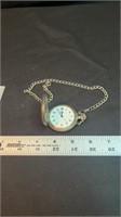 Silver engraved pocket watch with chain