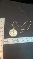 Elgin gold pocket watch with chain