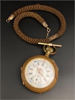 Antique pocket watch with antique hair watch chain