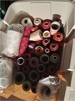 Various colors of thread close to full thread