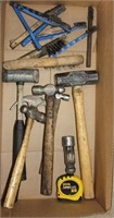 box of hammers/wire brushes