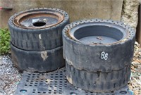 4 SKID STEER WHEELS-RUBBER IS NO GOOD