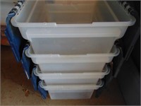 4 smaller totes with built in lids