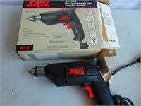 Almost new power drill with box