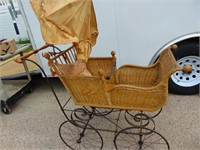 Vintage baby buggy with umbrella. in nice shape