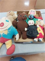 Assorted stuffed animals and dolls