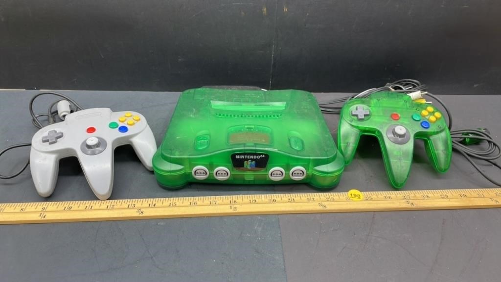 Nintendo 64 w/2 Controllers (untested). Slight