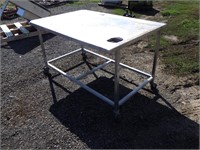 38" x 57" Stainless Rolling Table