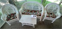 Wicker patio set with love seat, two chairs and