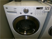 TROMM LG WASHING MACHINE FRONT LOAD WITH RISER