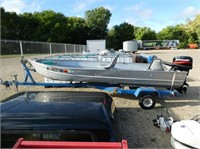 14' aluminum boat with Mercury 20 hp motor and tra