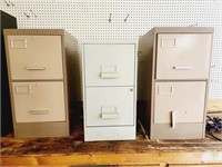 Group of three office file cabinets