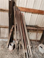 Pile of metal fence posts