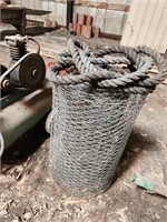 small roll of metal fence and some rope