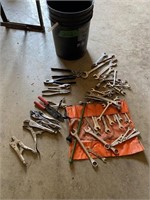Pail of wrenches and pliers etc.