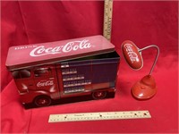 Coca-Cola tin and light