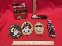 Coca-Cola trays, pens, and more