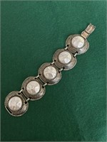 Gold fashion bracelet with pearlized