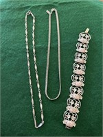 Two silver chain necklace’s
