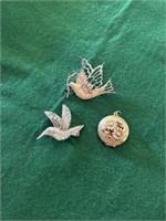 Dove and Hummingbird pins and gold locket with