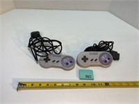 2 Super Nintendo Controllers