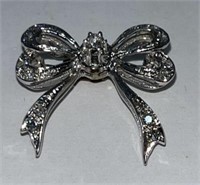 14kt white gold  and diamond bow broach