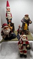 Four Santa figurines