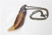 A Cave Bear Tooth Pendant Necklace