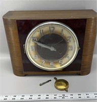 Antique mantel clock with pendulum