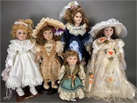 5 PORCELAIN DOLLS 1 NUMBERED 1 WITH COA
