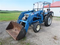 Universal loader tractor, diesel, 2WD, showing
