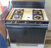 Gas stove, very dirty, but works