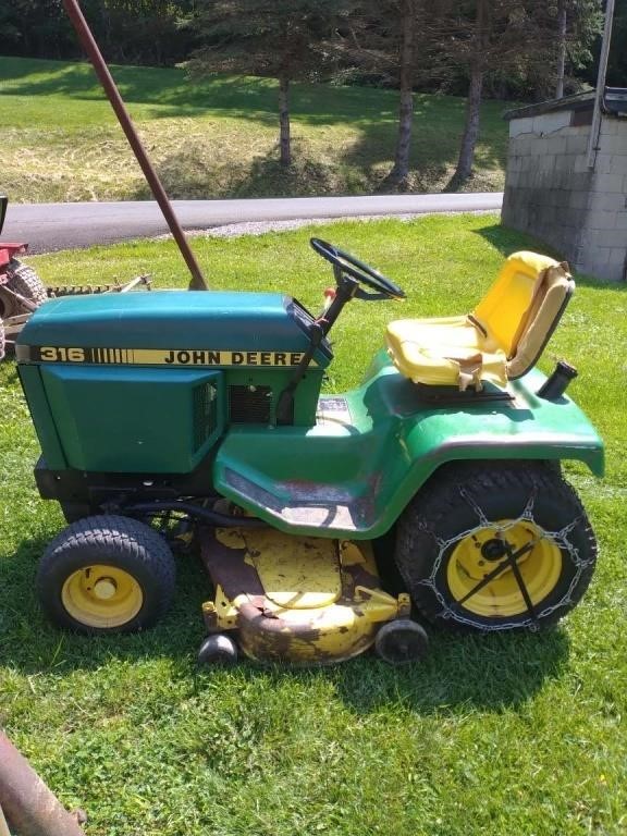 John Deere 316 Lawn Tractor w/ Deck & Chains