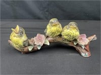 Lefton bird figurine on branch roughly 9 inches