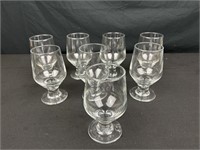Eight stemware clear glasses, each glass roughly