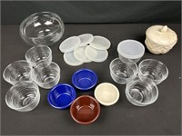 Eight small glass containers with lids bowl and