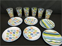 Fish plates with drinking glasses, all plastic