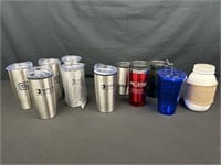 Several travel mugs