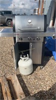 Charbroil Grill and propane bottle