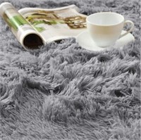$70 (5 ft X 7 ft) Grey Fluffy Area Rug