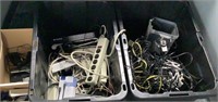 Assorted Electronic Cords Power Strips Phones Etc.