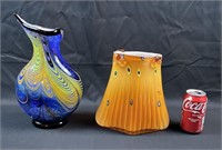 pair of murano glass items shown